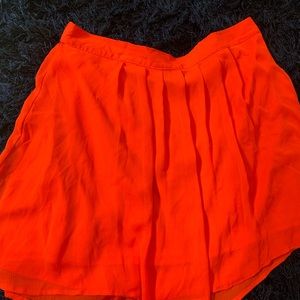 Red-orange skirt